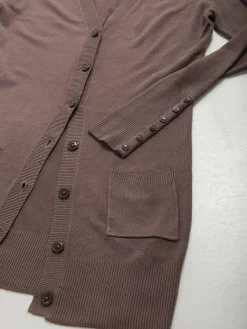 Casaco malha comprido com bolsos