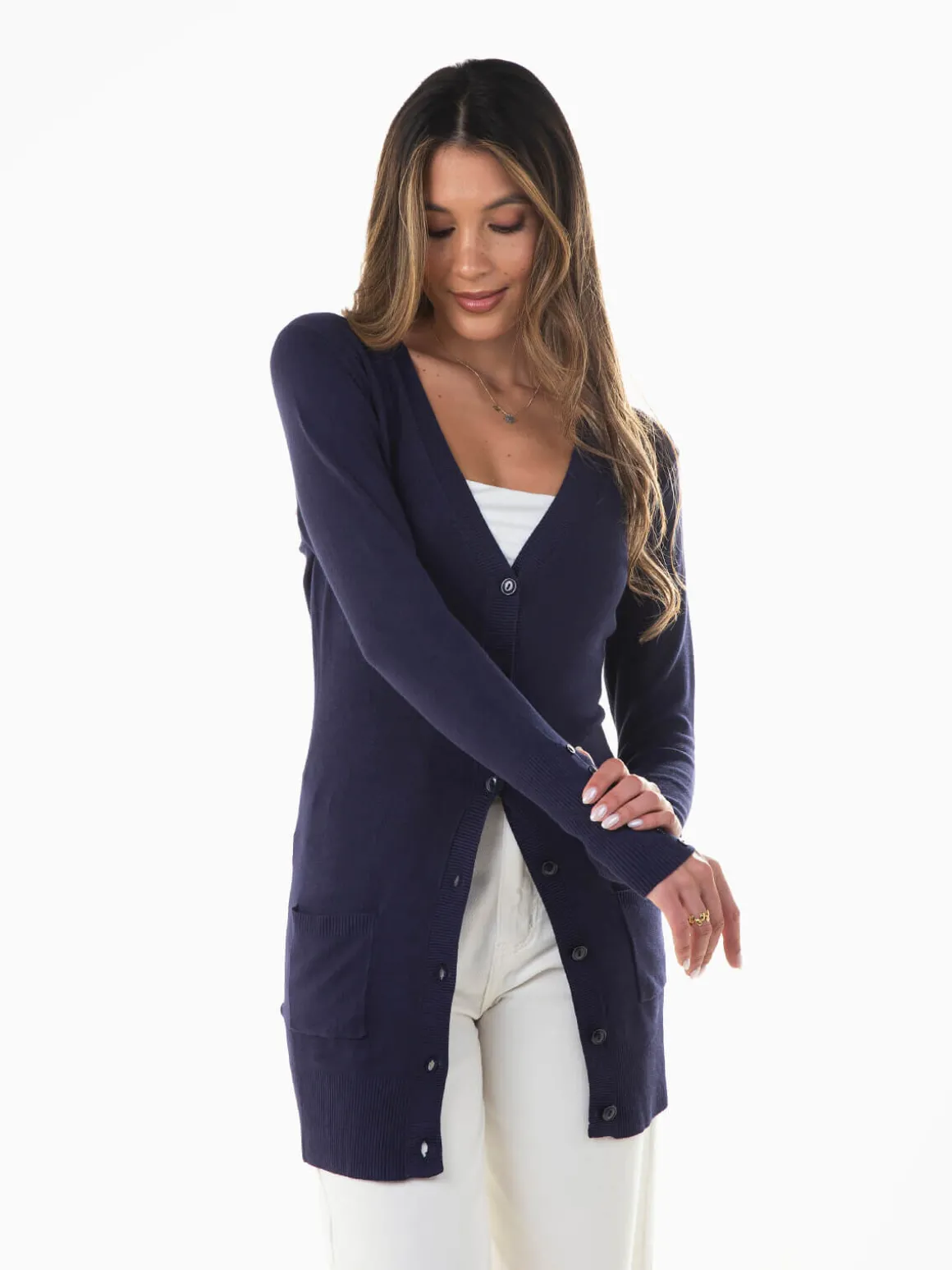 Casaco malha comprido com bolsos