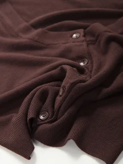 Casaco malha estilo bolero com botões