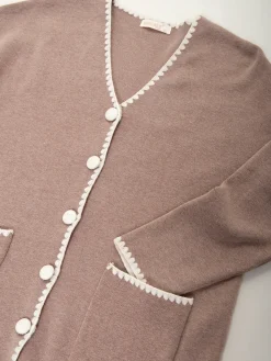 Casaco malha pormenor em contraste