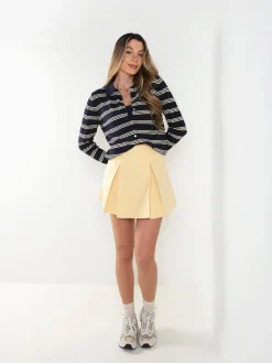 Casaco malha às riscas gola polo