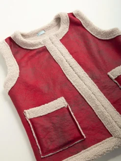 Colete efeito pele com pelo encaracolado