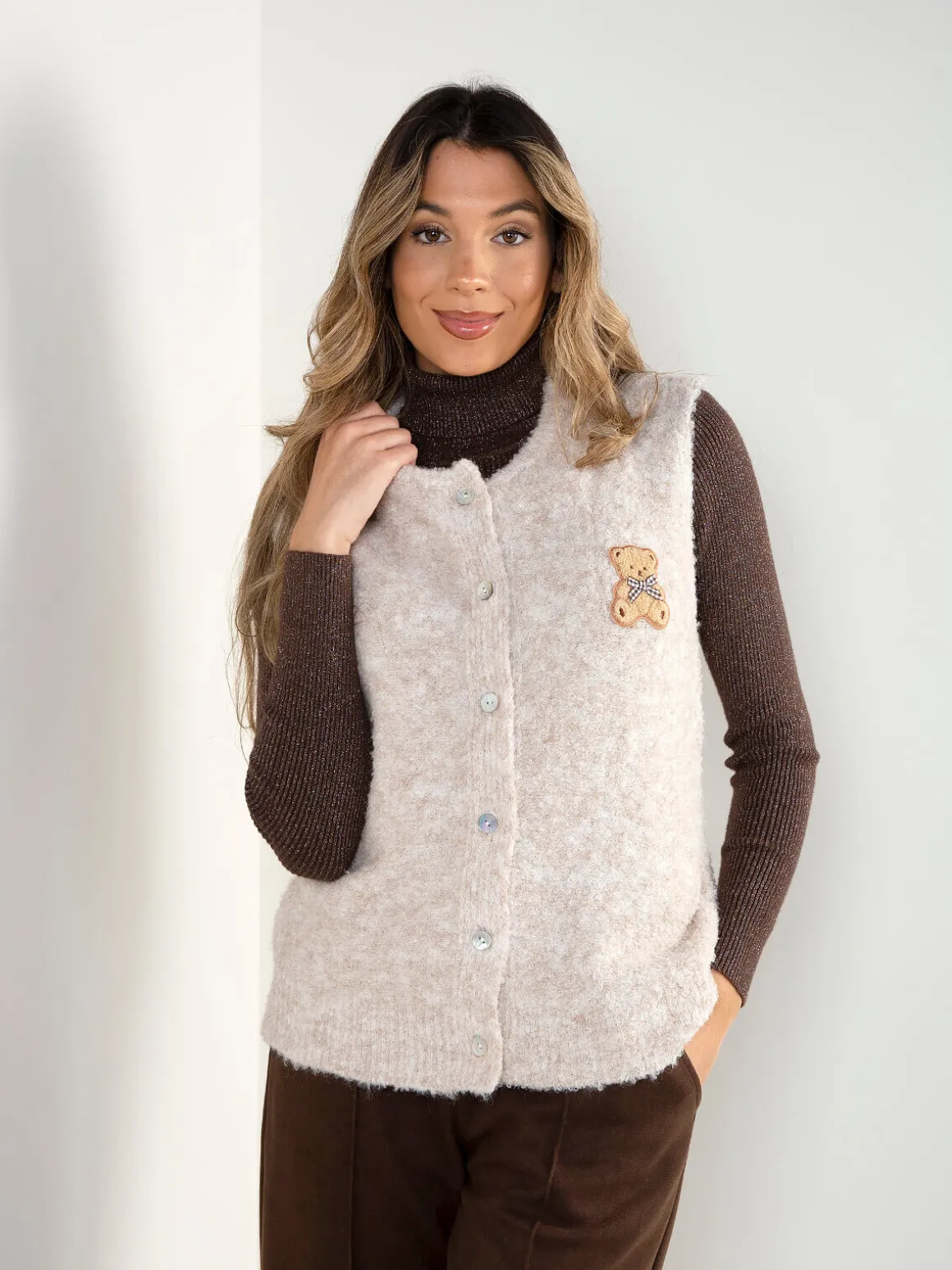 Colete malha com aplicação de urso