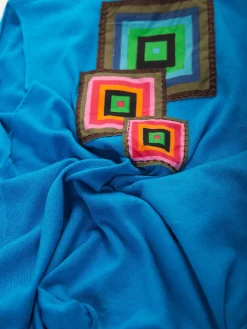 Colete malha com bordados