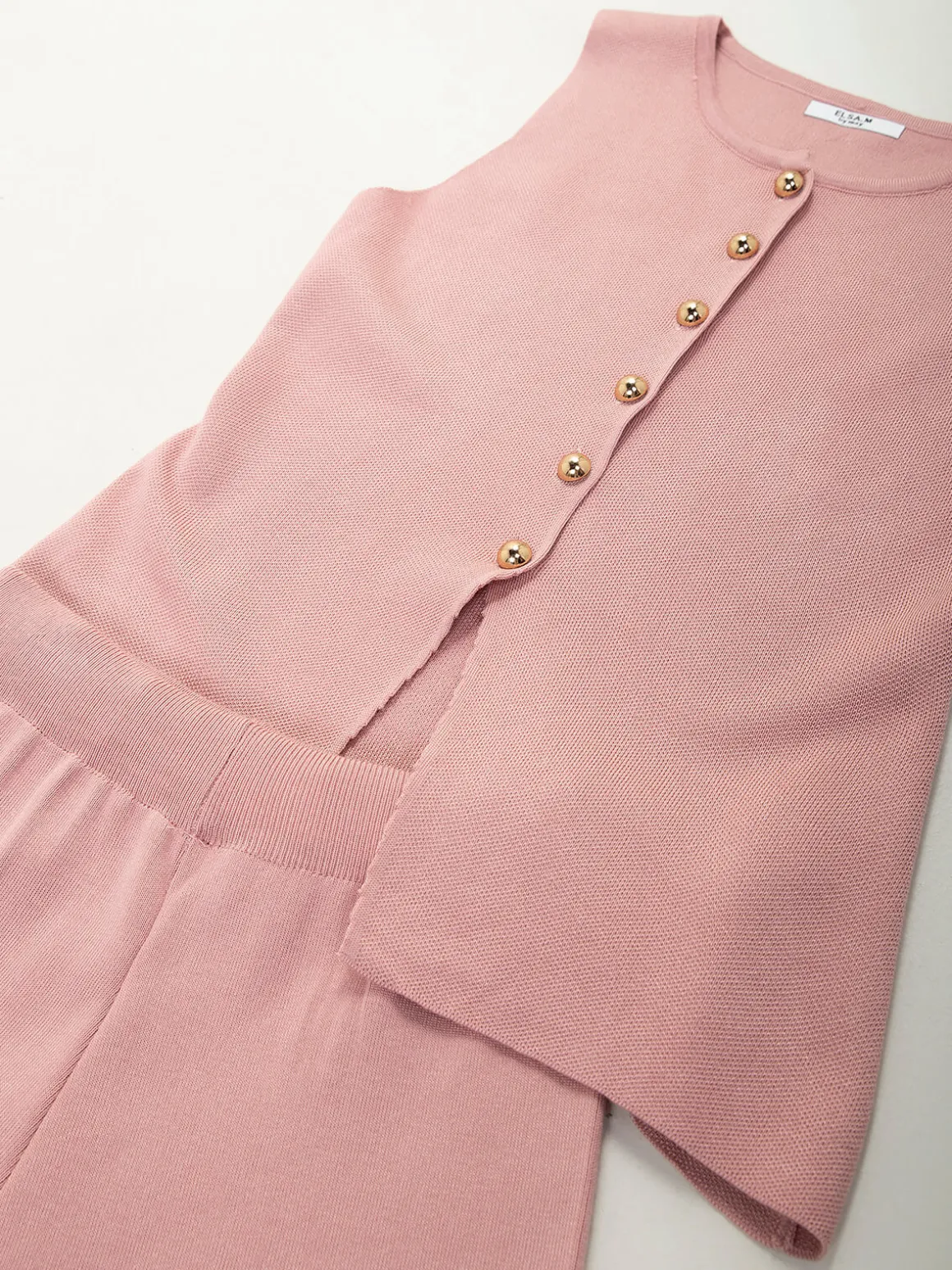 Conjunto em malha com colete e calças