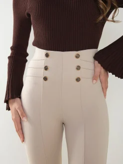 Leggings cintura alta botões dourados