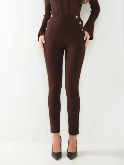 Leggings cintura alta com botões decorativos