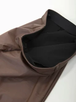 Leggings efeito pele à boca de sino