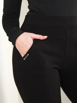 Leggings pretas cintura alta com bolsos