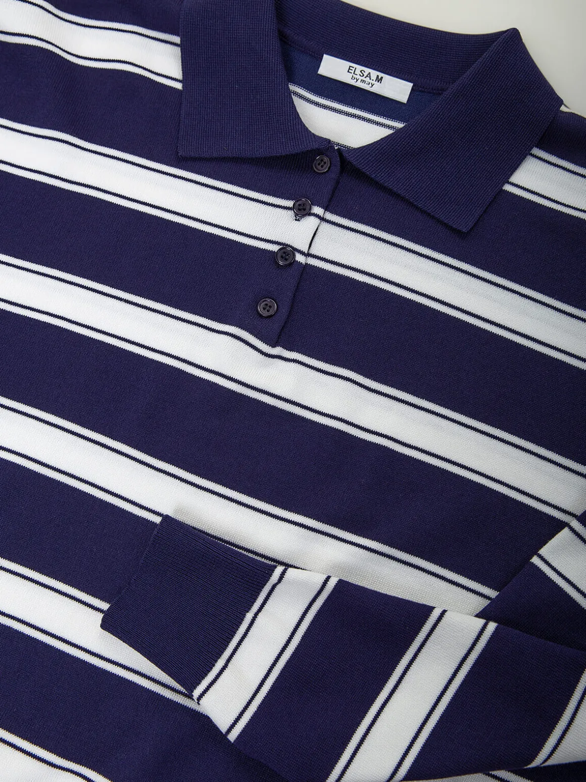 Polo malha às riscas