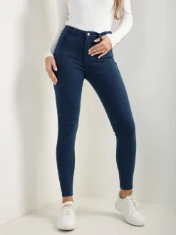 Skinny jeans cintura alta