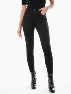 Skinny jeans cintura alta