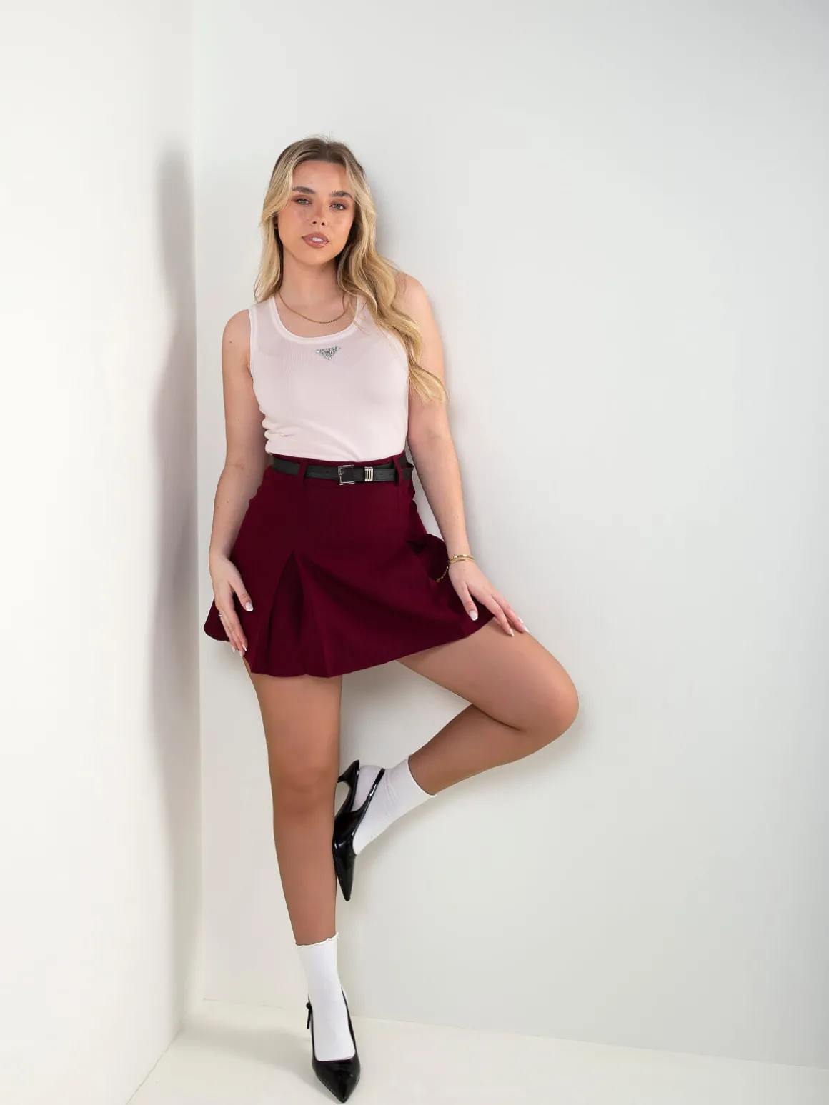 Top malha com detalhe brilhante