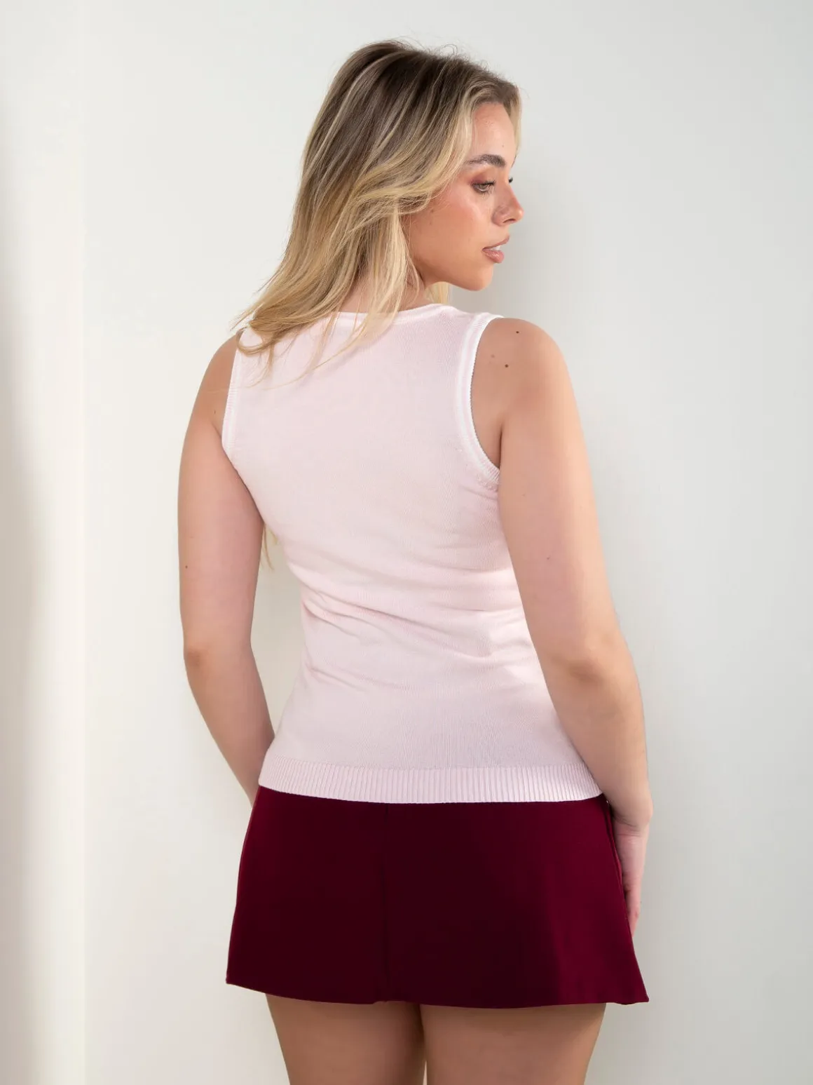 Top malha com detalhe brilhante