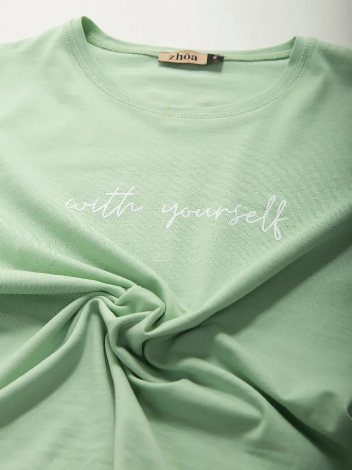 T-shirt manga curta com mensagem